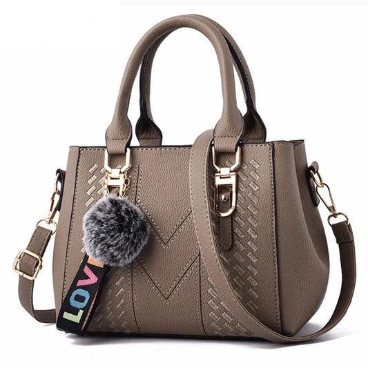 Embroidery Chic Women's Leather Messenger Bag with Hairball Detail: A Stylish Handbag for Ladies