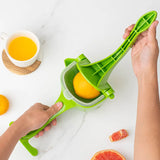 Compact Manual Juicer: Hand-Operated Squeezer for Cherries, Oranges, Lemons, Grapes - Crafted from Food-Grade Plastic for Fresh Home Juicing