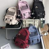 Large Capacity Waterproof Nylon School Backpack: Designed for Girls and Women, Ideal for Travel and College Students, Includes Laptop Compartment