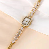 Luxury Women's Steel Wristwatch with Unique Gold Quartz Movement - Elegant Ladies' Watch for Her