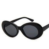 Trendy Oval Goggle Sunglasses for Ladies: Hot Vintage Retro Style with White and Black Frames, UV Protection