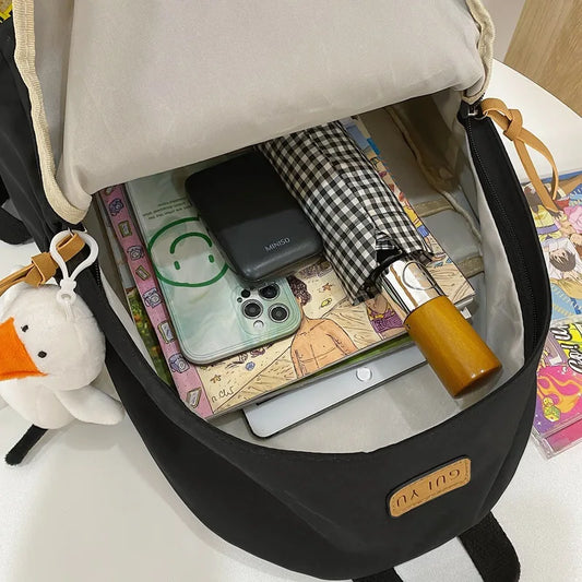 High School Backpack for Girls: College Student Laptop Backpack, Women's School Backpack for Teen Girls, Cute Black Bookbag with Duck Doll