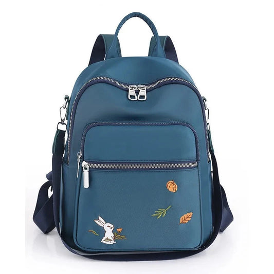 Chic Embroidered Women's Backpack: Casual Small School Bag with Anti-Theft Features, Ideal for Leisure and Shoulder Carrying