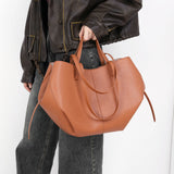 Vintage genuine leather shoulder bag for women, offering ample capacity, ideal for shopping and commuting