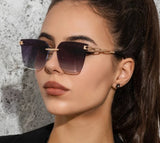 Luxury Big Cat Eye Sunglasses for Women: Oversized Rimless Design, Fashionable Grey Lenses for Driving, UV400 Protection Shades