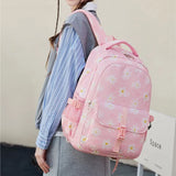 Big school backpacks for girls aged 7 to 10: Purple bag with flowers and lots of pockets, great for middle school